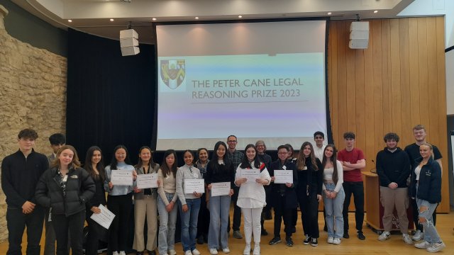 Peter Cane 2023 attendees stand with their certificates